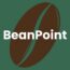 Ruskea kahvipapu vihreällä taustalla, jonka päällä lukee valkoisella tekstillä BeanPoint